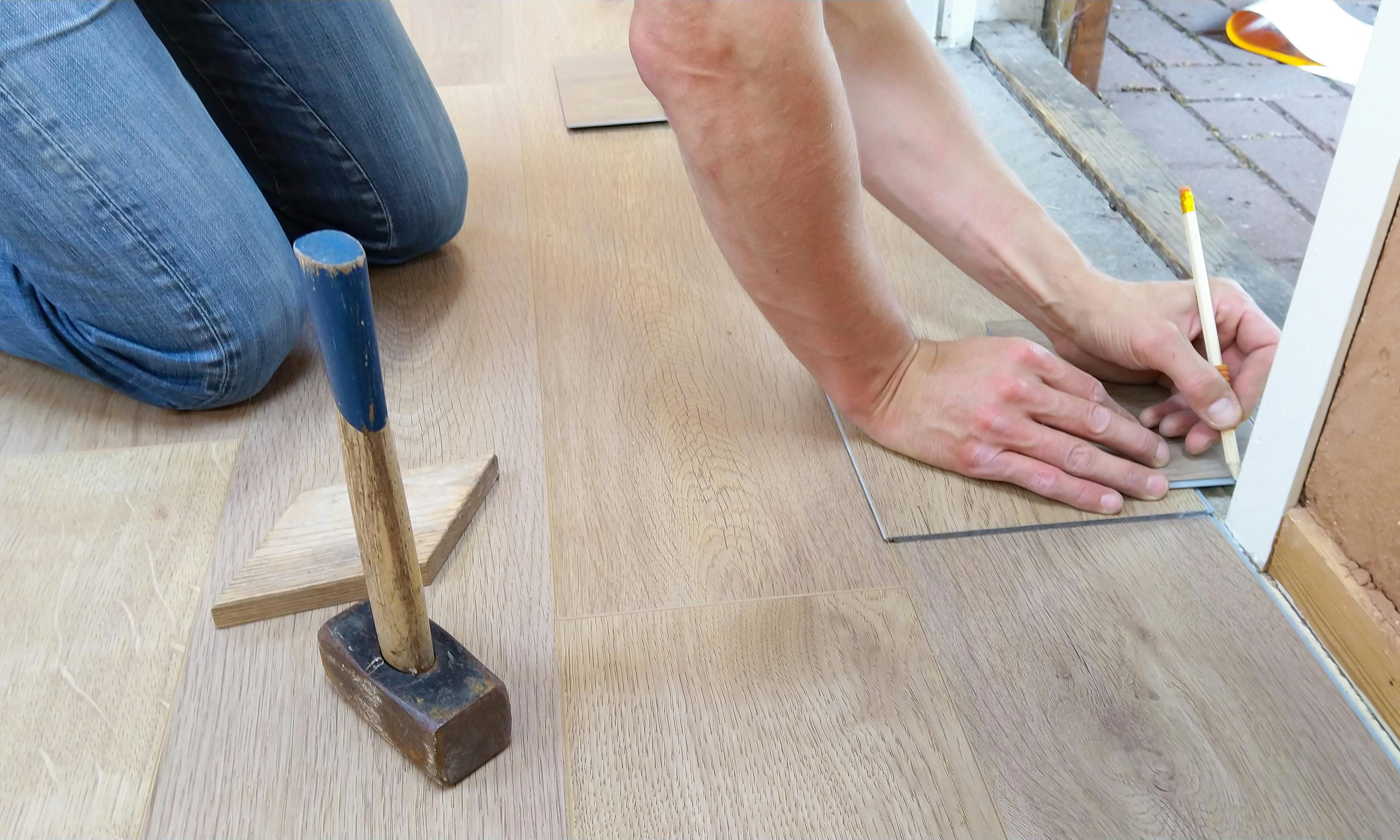 Installer Working on Floor
